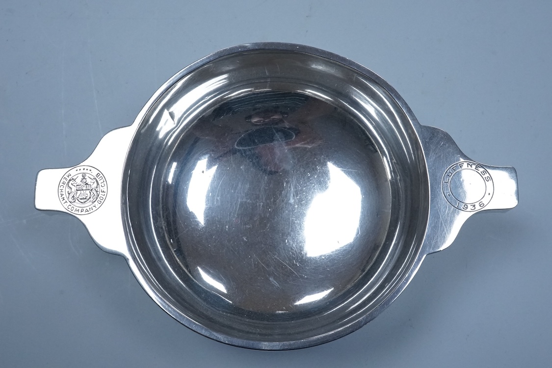 A George V Scottish silver quaich, by Wilson & Sharp, Edinburgh, 1924, 14.4cm over handles, engraved 'Merchant Golf Club, Luffness, 1936', 3.5oz.